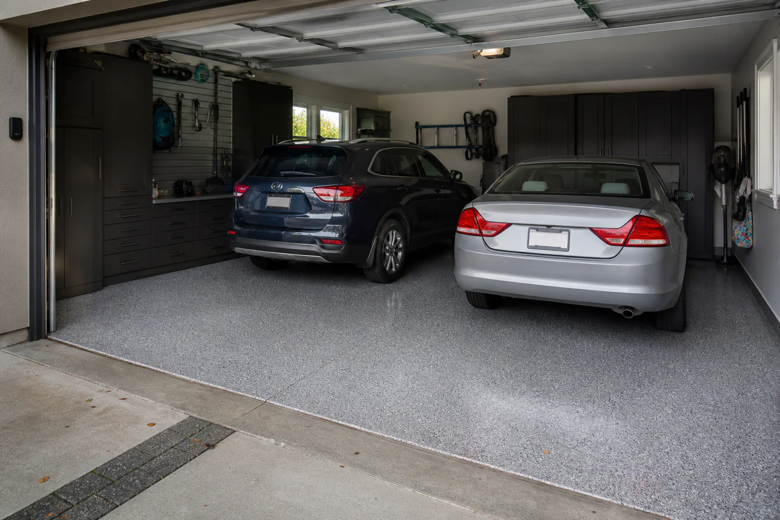 Finished two-car garage with a practical SUV and sedan