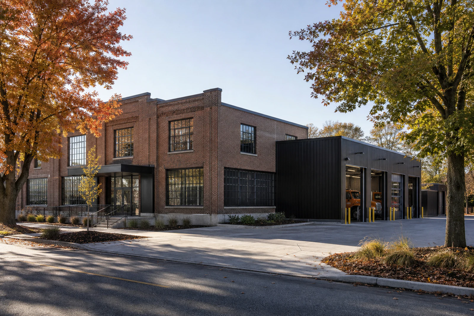 Renewed brick civic works depot with a contemporary service wing