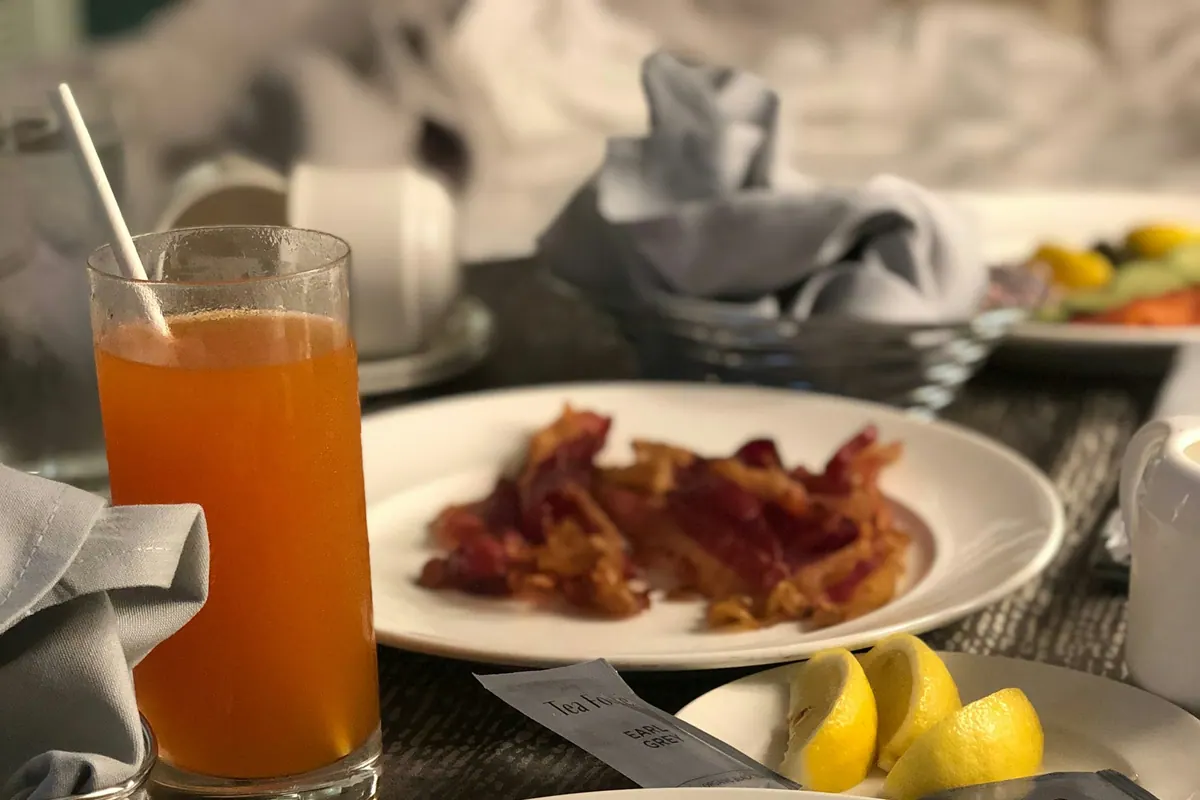 A plated breakfast on a white ceramic plate